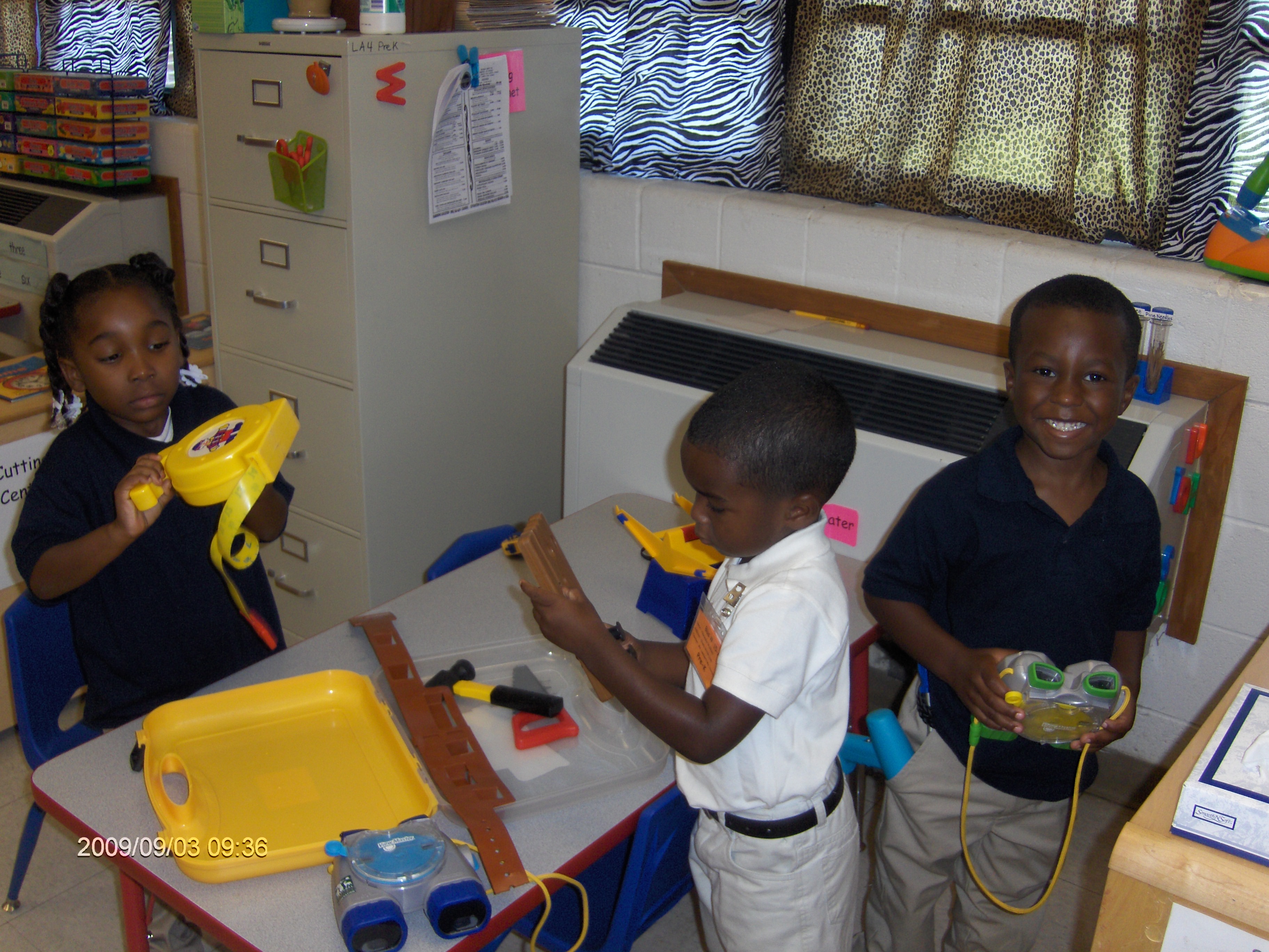 Larissa, Alexander and Martin in the Science Center.