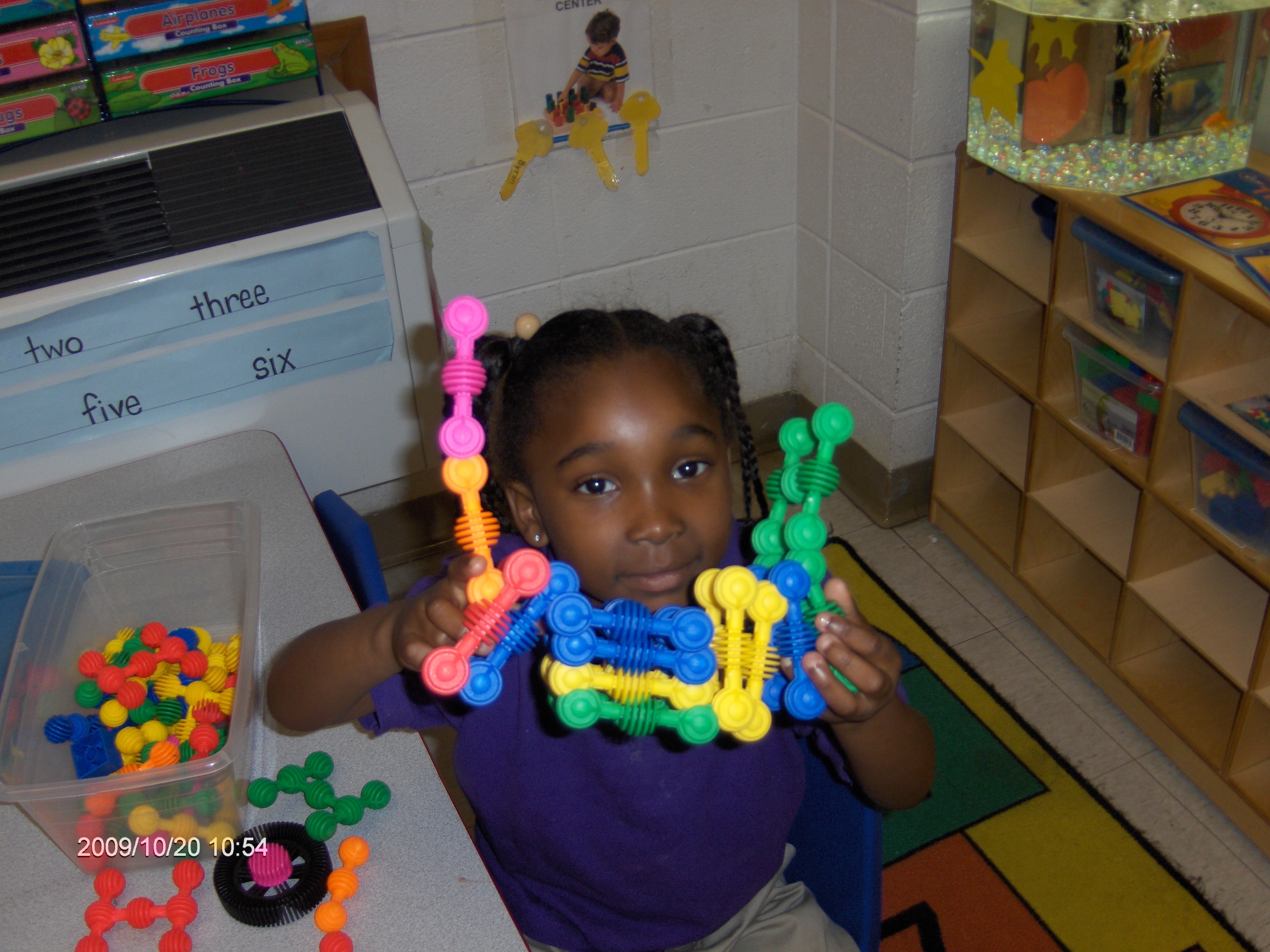 Larissa working her fine motor skills